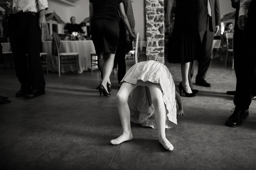 Girl does yoga at Virginia wedding.