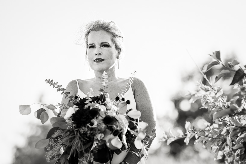 Bride awaits her cue by Denver wedding photojournalist.