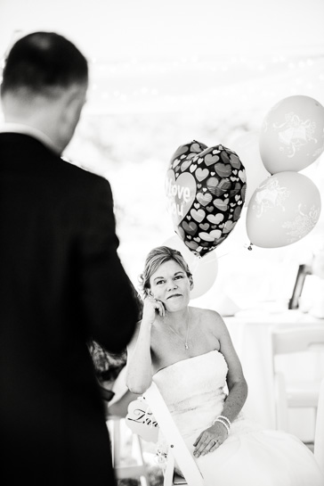 Groom toasting bride by Denver wedding photojournalist
