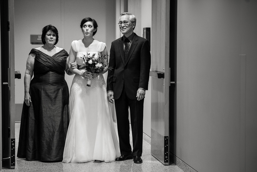 Nervous bride and her parents before a wedding processional at the History Center Colorado.