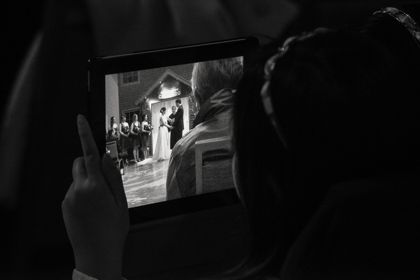 Guest films a wedding ceremony on an iPad at the History Center Colorado.