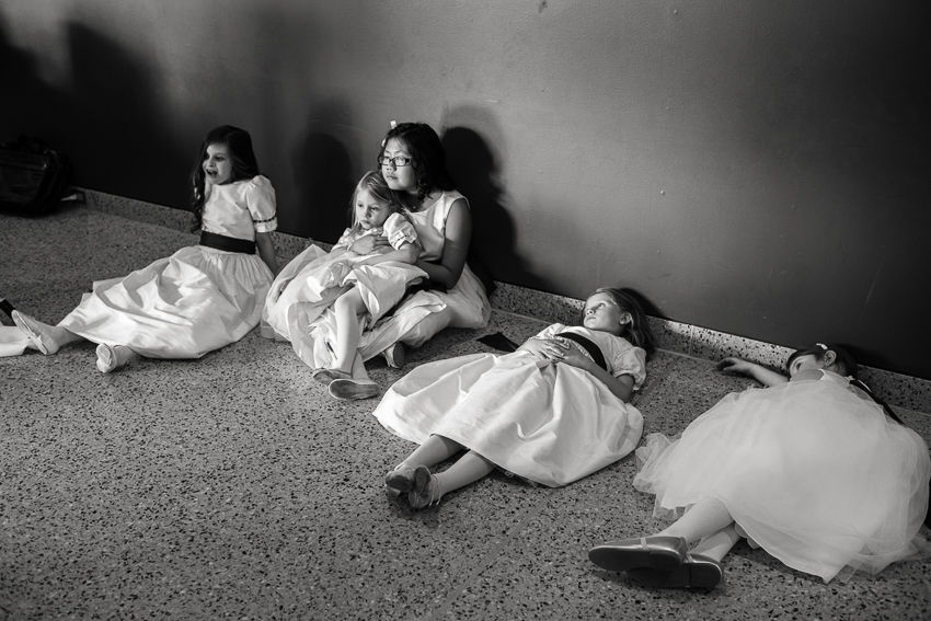 Exhausted flower girls at a the History Center Colorado by Denver wedding photographer.