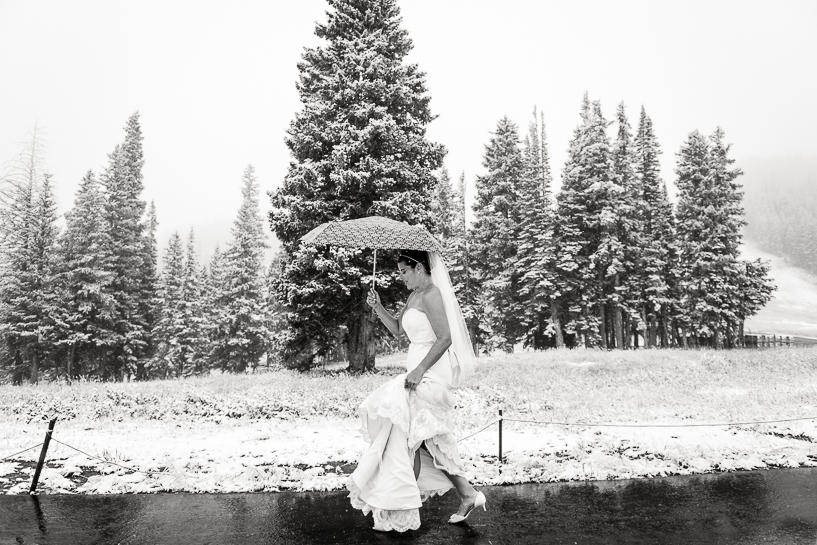 Bride on her way to the Beaver Creek Wedding Deck on a snowy day.
