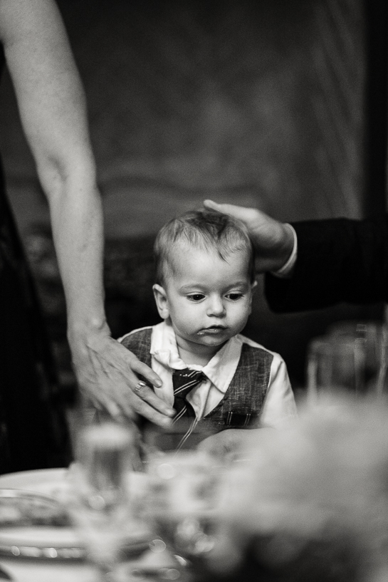 Toddler at wedding reception.