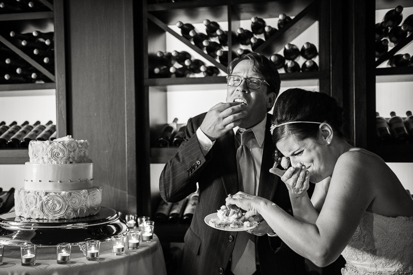 Vail wedding photojournalist captures bride and groom after cake cutting.