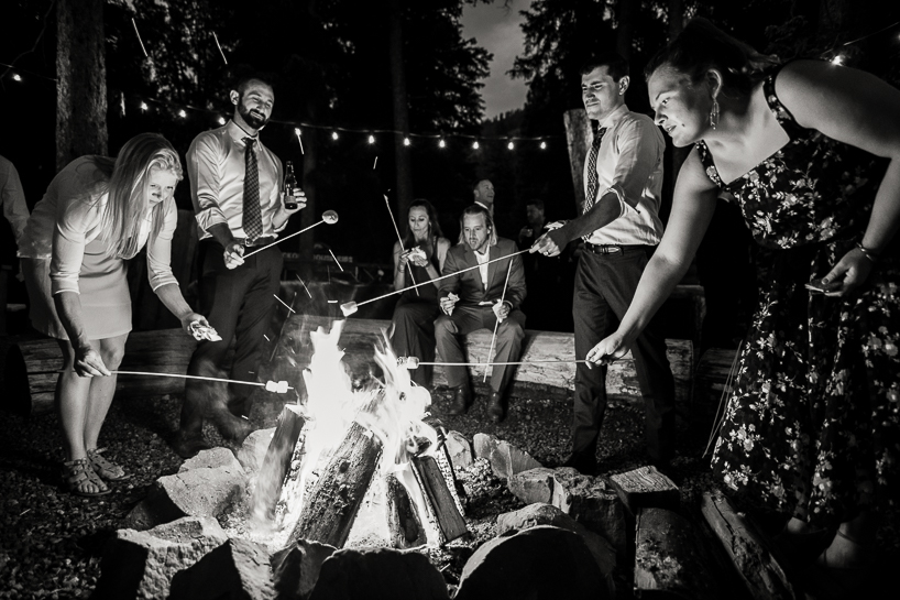 Making s'mores at a casual Aspen wedding reception.