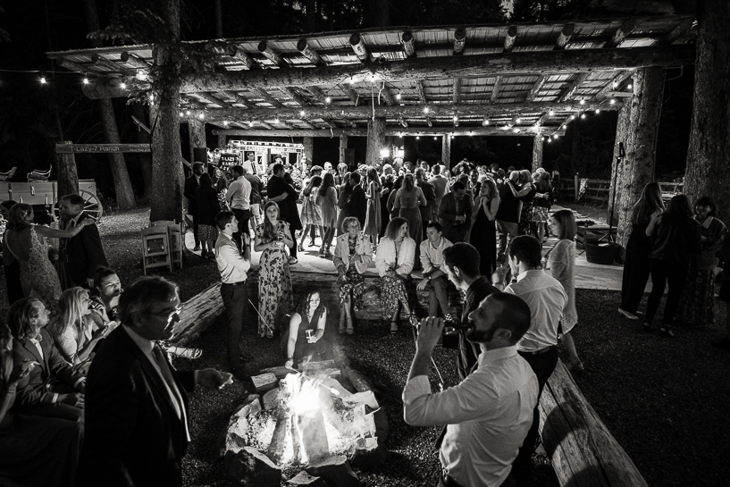 Aspen wedding reception at T-Lazy-R ranch, with open pavilion for dancing and large campfire.
