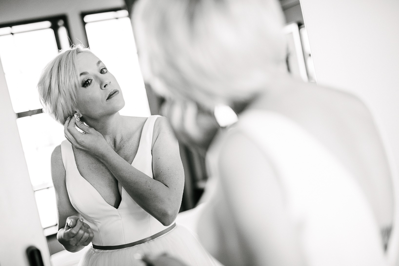 Denver wedding photojournalist captures bride getting ready at the Ramble Hotel in Denver.
