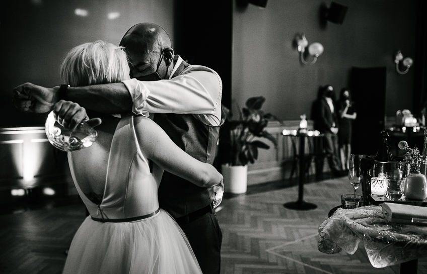 Bride and groom on the dance floor at the end of their wedding reception at The Ramble Hotel in Denver.